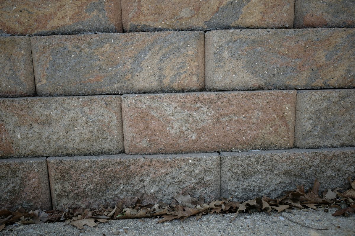 Close detail of an interlocking block retaining wall